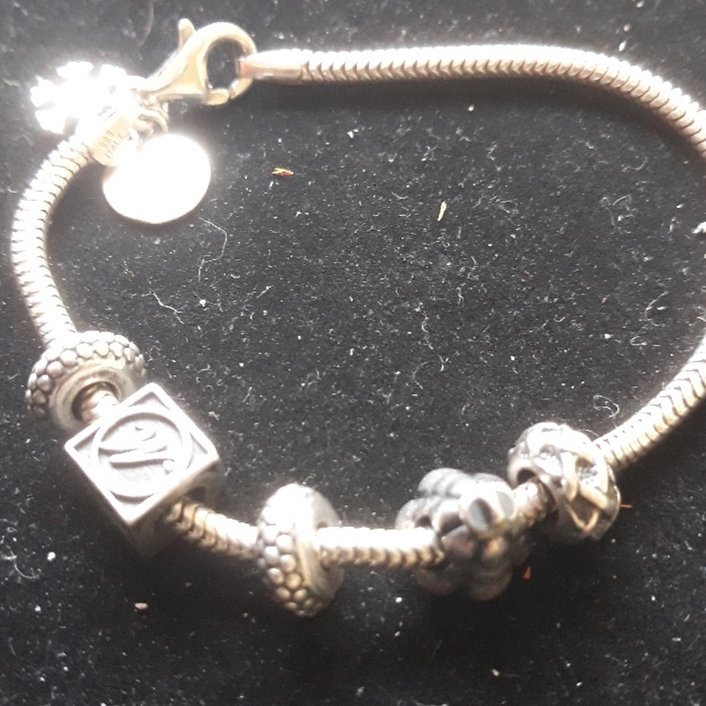 Ladies sterling silver charm bracelet
